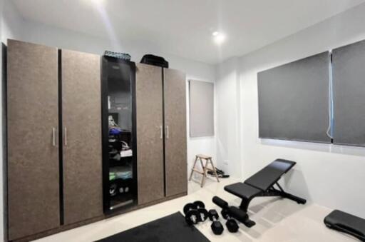 Modern bedroom with gym equipment