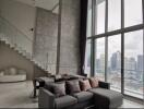 Modern living room with high ceilings and city view
