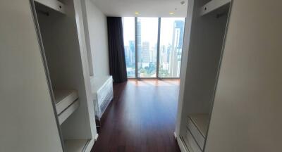 Modern corridor in a high-rise apartment with city views