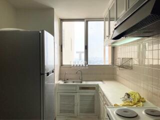 Bright city-view kitchen with modern appliances