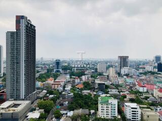 Panoramic view of a city with modern skyscrapers and residential buildings