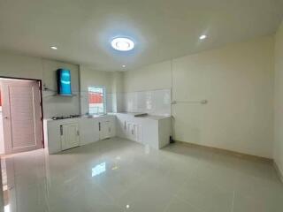 Bright and modern kitchen with high gloss flooring