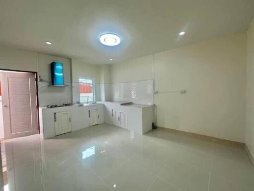 Bright and modern kitchen with high gloss flooring