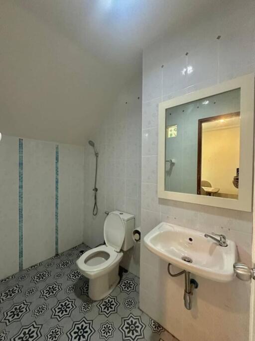 Compact bathroom with modern amenities