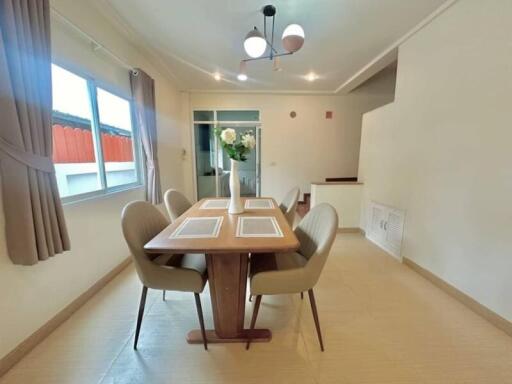 Bright dining room with modern table and chairs