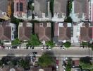 Aerial view of residential neighborhood showing rooftops and street layout