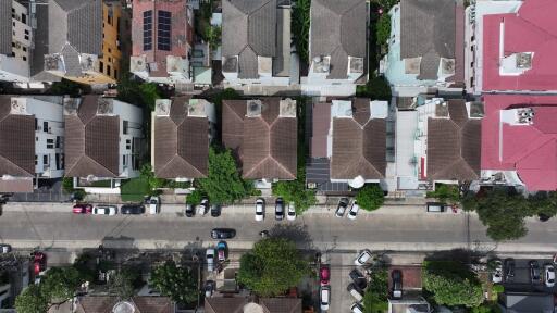 Aerial view of residential neighborhood showing rooftops and street layout