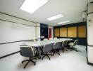 Spacious conference room with modern chairs and professional decor