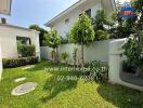 Lush garden with stepping stones leading to the house