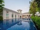 Luxurious house with large swimming pool and elegant architecture