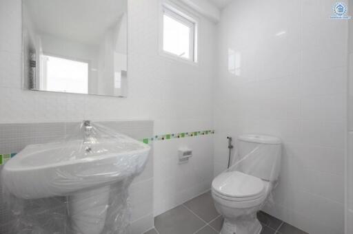 Modern and clean bathroom with white fixtures