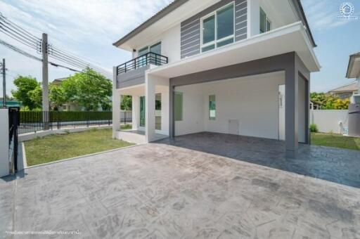 Modern two-story house with spacious front carport