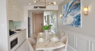 Elegant dining area with marble table and modern decor