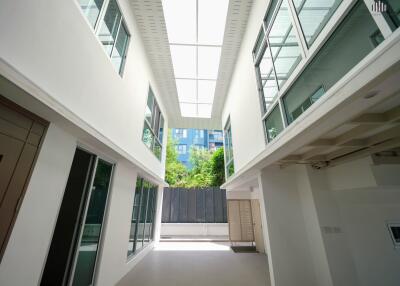 Bright atrium with glass windows and skylight