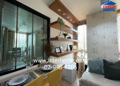 Modern living room with decorative shelves, large window, and seating area