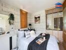 Cozy and stylish bedroom with accent wall and natural light