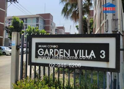 Exterior sign of Miami Condo Garden Villa 3 with contact details