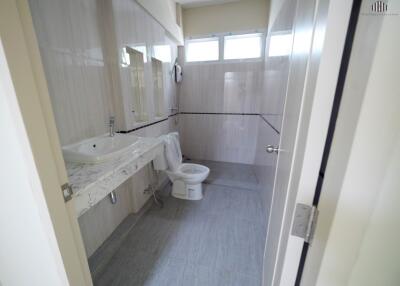 Modern bathroom with large sink and natural light