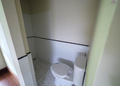 Modern bathroom with tiled shower area