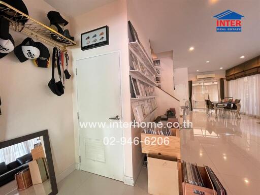 Entrance area leading into a spacious and well-lit apartment