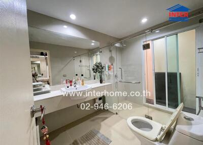 Spacious modern bathroom with shower and elegant design