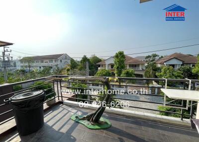Spacious balcony with scenic view of residential neighborhood
