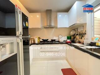 Modern kitchen with stainless steel appliances and ample counter space