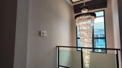 Elegant crystal chandelier lighting in a modern home interior