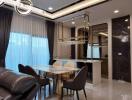 Elegant living room and dining area with modern furnishings and decor