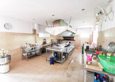 Spacious commercial kitchen in a restaurant with professional equipment