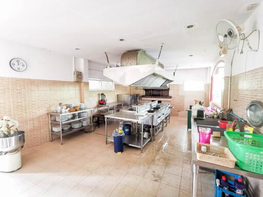 Spacious commercial kitchen in a restaurant with professional equipment