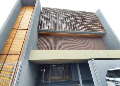 Modern residential exterior showcasing wooden slat architecture