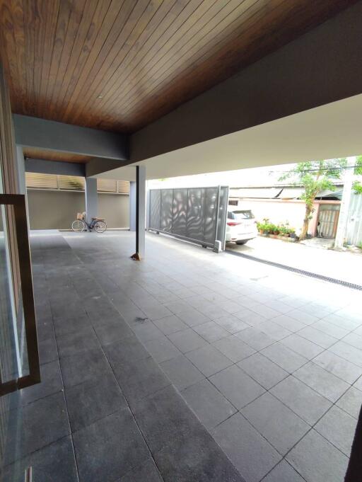 Spacious covered porch area with modern design