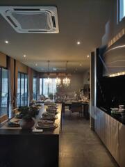 Elegant dining room with modern decor and atmospheric lighting