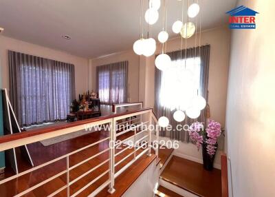 Brightly lit hallway with modern decor