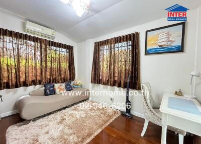 Cozy living room with natural light and stylish decor