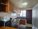 Well-equipped kitchen with modern appliances and ample cabinet space