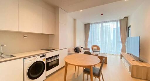 Modern living room with integrated kitchen facilities