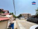 Suburban street view showing residential houses with clear sky