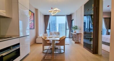 Modern living room with dining area and city view