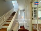 Elegant hallway interior with staircase and wooden floors