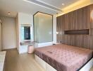 Modern bedroom with stylish decor and ambient lighting