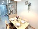 Modern styled dining room with set table and contemporary decor