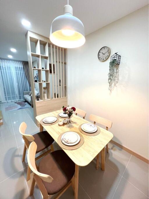 Modern styled dining room with set table and contemporary decor