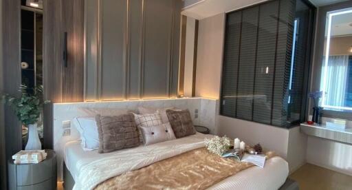 Stylish modern bedroom with elegant decor and ambient lighting