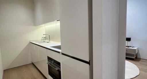 Modern kitchen with built-in appliances and minimalist design