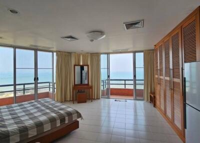 Spacious sea view bedroom with balcony access