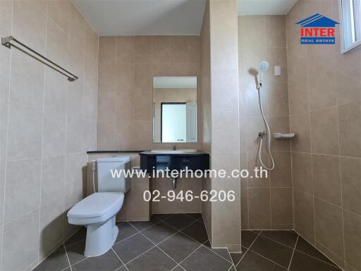 Modern and clean bathroom interior with shower and toilet