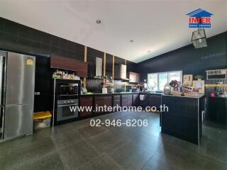 Spacious modern kitchen with stainless steel appliances