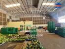 Spacious warehouse interior with storage crates and fresh produce